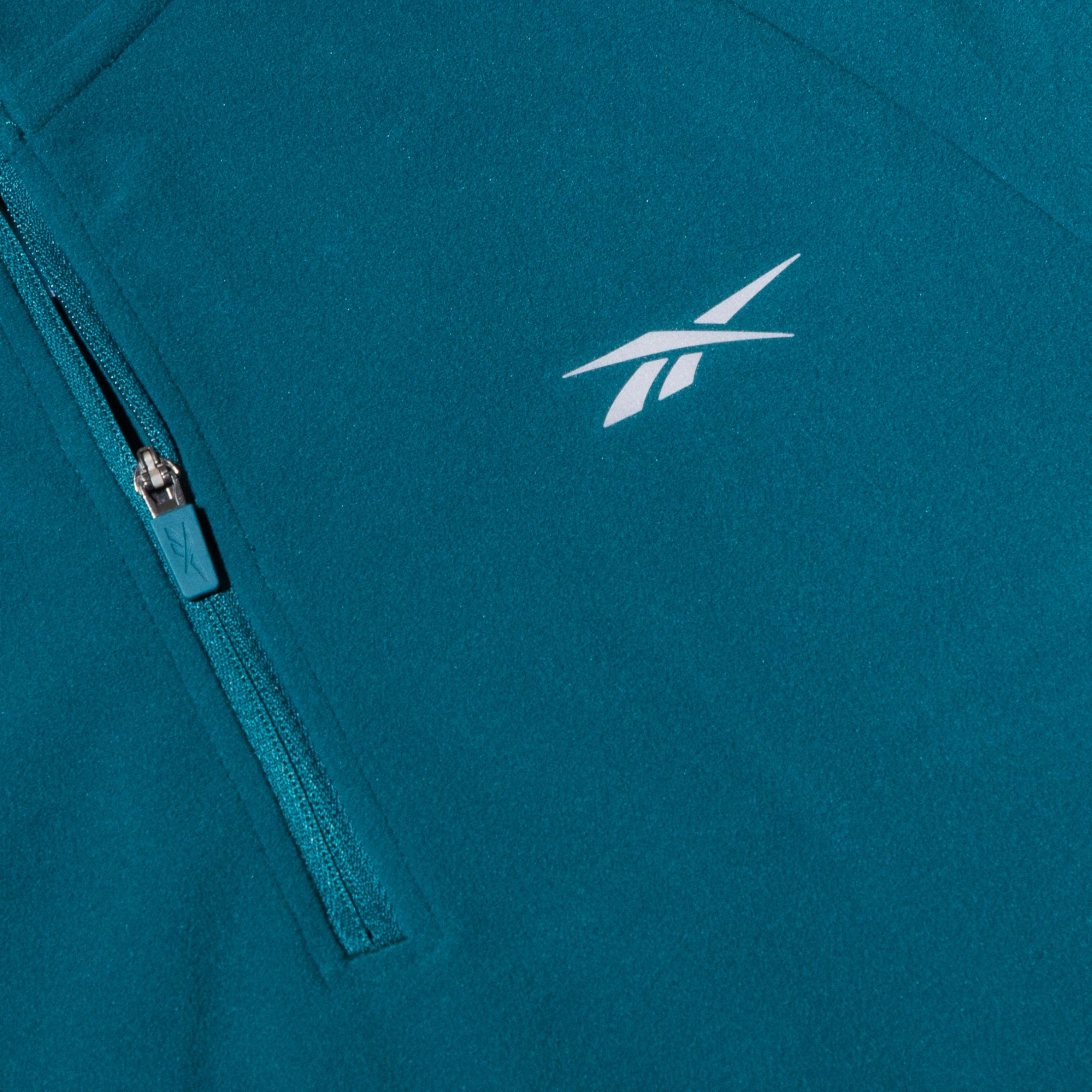 Sudadera con capucha y cremallera 1/4 manga larga image number 4