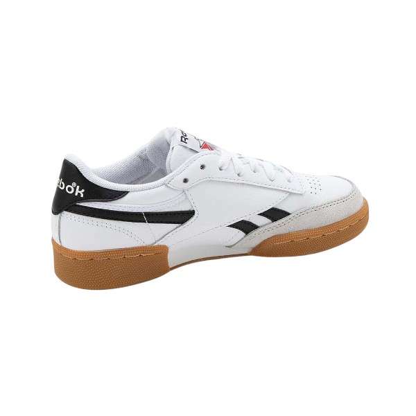 Tenis casuales inspirados en los años 80, con parte superior de cuero suave y rayas laterales de contraste.