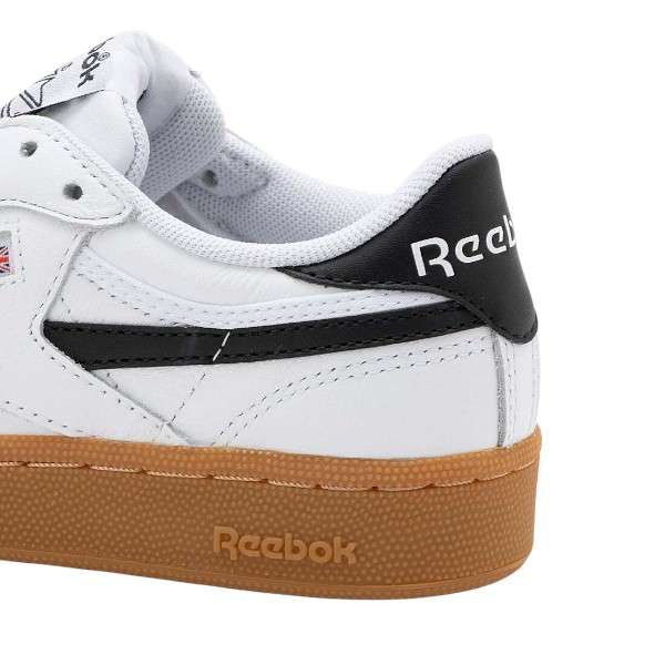 Tenis casuales inspirados en los años 80, con parte superior de cuero suave y rayas laterales de contraste. image number 5