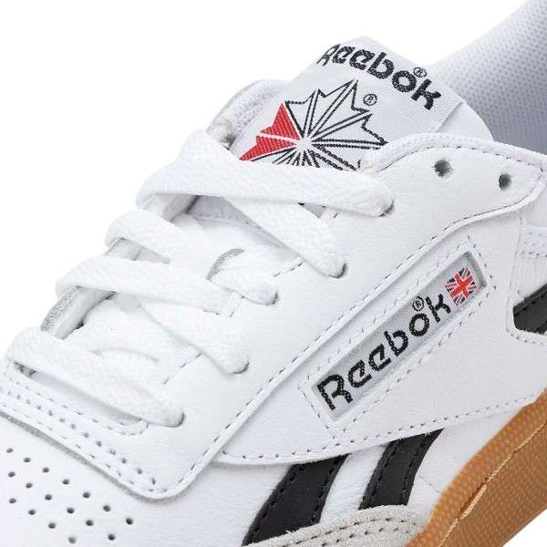 Tenis casuales inspirados en los años 80, con parte superior de cuero suave y rayas laterales de contraste. image number 7