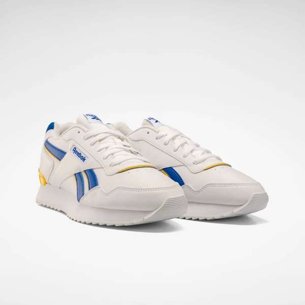 Tenis Glide Ripple Clip Con características clásicas de unos Reebok, pero destacándose por su suela ondulada y el clip TPU en el talón que les otorga un diseño único.