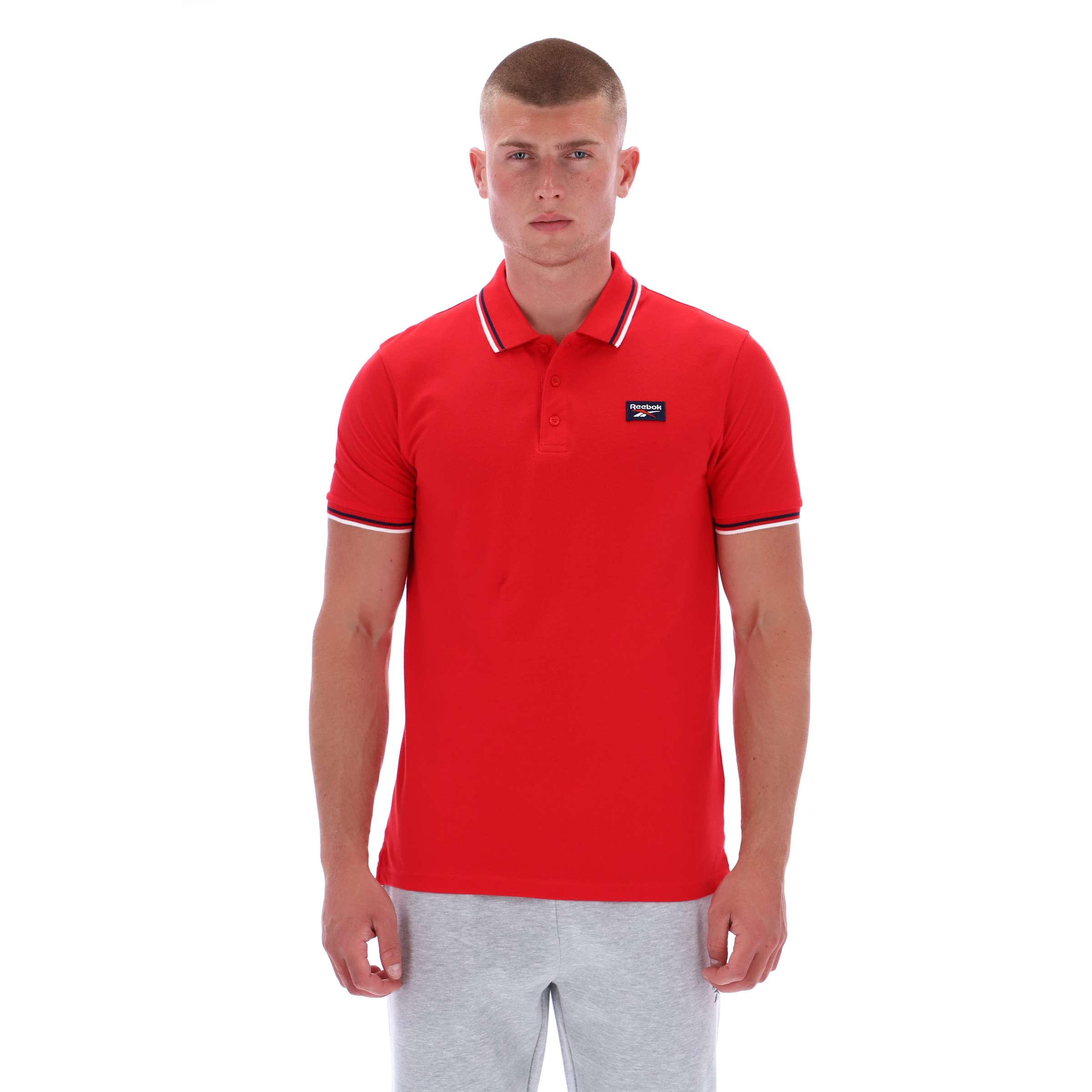 Polo Drake con vivos en cuello y mangas