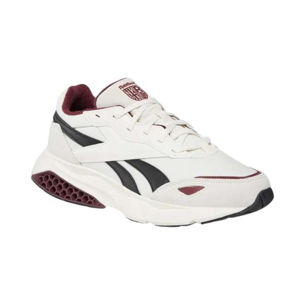 Tenis Hexalite Legacy 1.5 Con amortiguación Hexalite y una entresuela escultural, ofreciendo un estilo espacial. Su diseño en una paleta neutra combina tela y suede.