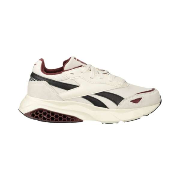 Tenis Hexalite Legacy 1.5 Con amortiguación Hexalite y una entresuela escultural, ofreciendo un estilo espacial. Su diseño en una paleta neutra combina tela y suede.