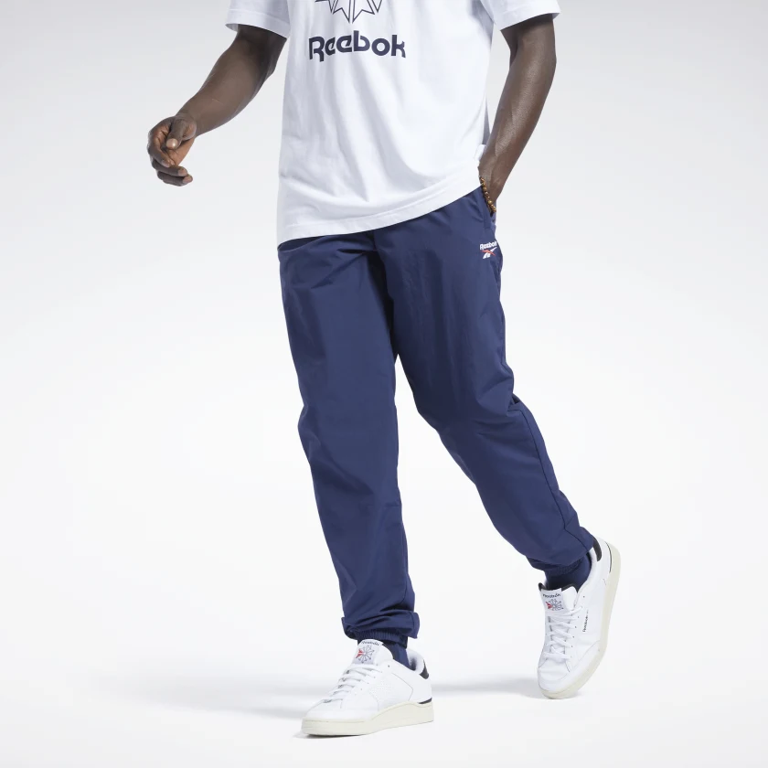 Pantalones reebok hombre dorados discount